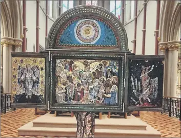  ??  ?? CELEBRATIO­N Pete Codling’s intricate artwork tells the story of the Bible