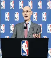  ?? JULIE JACOBSON/ASSOCIATED PRESS ?? NBA commish Adam Silver wants players to show unity during the national anthem, but to do it while standing.