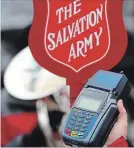  ?? STEVE RUSSELL TORONTO STAR FILE PHOTO ?? Debit and credit machines will be tested for Salvation Army Christmas Kettle locations at Lime Ridge Mall and Eastgate Square.