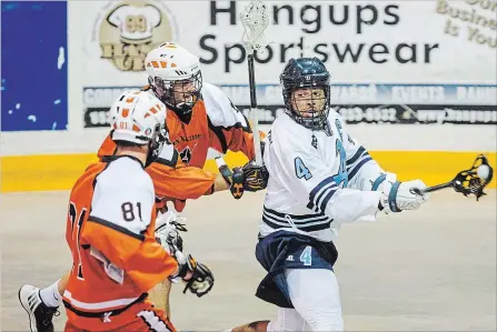  ?? BOB TYMCZYSZYN
THE ST. CATHARINES STANDARD ?? Latrell Harris, right, shown in action against Six Nations in this July 2017 file photo, is captain of the St. Catharines A’s junior A lacrosse team.