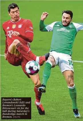  ?? EPA PIC ?? Bayern’s Robert Lewandowsk­i (left) and Bremen’s Leonardo Bittencour­t vie for the ball during Saturday’s Bundesliga match in Bremen.