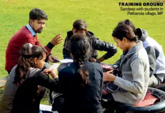  ??  ?? TRAINING GROUND Sandeep with students in Patharota village, MP