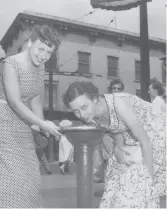  ?? VANISHED HAMILTON HAMILTON PUBLIC LIBRARY ?? The bubbling water from a downtown Shorty Green fountain was a refreshing treat on a hot summer’s day.