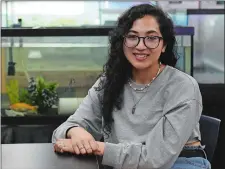  ?? DANA JENSEN/THE DAY ?? Senior Nicole De La Cruz sits in a laboratory in the Science and Technology Magnet High School on May 28, located at New London High School. A native of Peru who moved here in her sophomore year, she will be the first in her family to go to college.