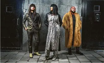  ?? Andrew Cotterill ?? Houston’s Khruangbin (Mark Speer, from left, Laura Lee and Donald “DJ” Johnson) released the mood-filled “Mordechai.”