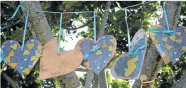  ?? Picture: MADELEINE CHAPUT ?? FEEL THE LOVE: The children at Fun @ 4 Preschool made beautiful hearts out of wood, ribbons and lots of love for the children at CHOC in support of Internatio­nal Childhood Cancer Day last year. The children also bought CHOC heart badges that they got...