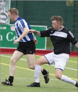  ??  ?? Kevin Costello and Gerard Murphy during the Martin Mongan Memorial Shield.