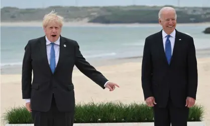  ?? Photograph: Leon Neal/PA ?? Boris Johnson with Joe Biden at the G7 summit in June. ‘The display of beach bonhomie looks all the more phoney after the US president’s brutal refusal to consult Britain over Afghanista­n.’