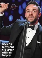  ??  ?? Back on form: Ant McPartlin with his trophy