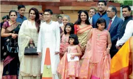  ??  ?? Family members of newly-elected President Ram Nath Kovind (clockwise from above), Congress president Sonia Gandhi, former Prime Minister Manmohan Singh and Prime Minister Narendra Modi during the swearing-in ceremony of the 14th President in the...