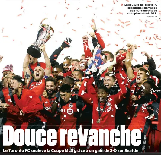  ?? PHOTO AFP ?? Les joueurs du Toronto FC ont célébré comme il se doit leur conquête du championna­t de la MLS.