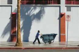  ?? TY O’NEIL/AP ?? A maintenanc­e worker pushes a refuse cart in the sun last month in Las Vegas.
