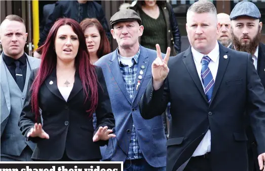  ??  ?? Bravado: Jayda Fransen and Paul Golding with their Britain First supporters outside Folkestone Magistrate­s’ Court yesterday