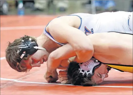  ?? [BARBARA J. PERENIC/DISPATCH] ?? Kyle Lawson, top, of Olentangy Liberty will go for his fourth state title and try to lead the Patriots to a team championsh­ip, which would be a first for the Central District. Lawson is 39-3 this season at 160 pounds.