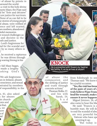  ??  ?? VESTMENTS The pontiff wore green He is presented with flowers by Saoirse McCarthy, 11, as he arrives at airport