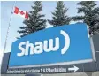  ?? JEFF MCINTOSH/THE CANADIAN PRESS ?? A Shaw Communicat­ions sign at the company’s headquarte­rs in Calgary.