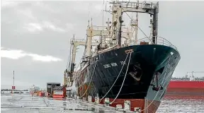  ??  ?? The fire-damaged Dong Won is to be scuttled off the coast of Dunedin.