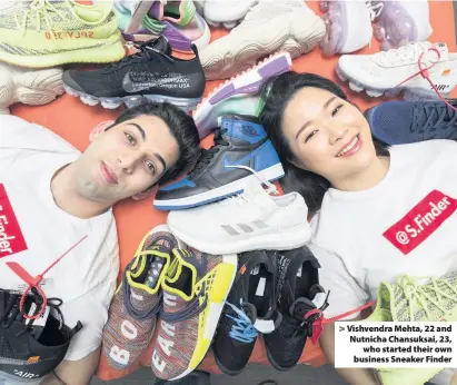 ??  ?? > Vishvendra Mehta, 22 and Nutnicha Chansuksai, 23, who started their own business Sneaker Finder