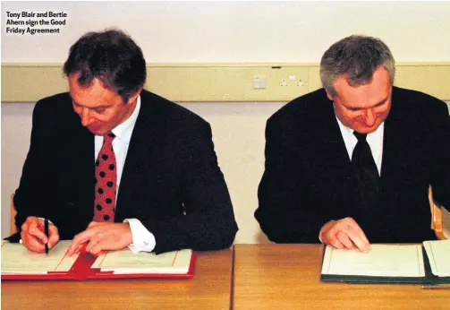  ??  ?? Tony Blair and Bertie Ahern sign the Good Friday Agreement