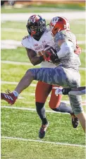  ?? DARRON CUMMINGS/AP ?? Indiana’s Micah McFadden intercepts a pass intended for Maryland’s Brian Cobbs during the second half Saturday.