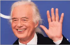  ?? Photos and text from wire services Domenico Stinellis / Associated Press ?? Guitarist Jimmy Page at the photo call for the movie “Becoming Led Zeppelin” at the 78th Venice Film Festival.