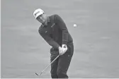  ?? NICK WASS/AP ?? Keegan Bradley hits from the 15th fairway during the third round of the Wells Fargo Championsh­ip on Saturday in Potomac, Md.