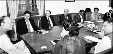  ?? PTI ?? Finance Minister Arun Jaitley and RBI Governor Urjit Patel along with other top offcials at a meeting on Friday.