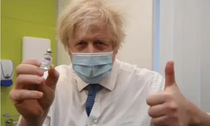  ?? Photograph: AFP/Getty ?? Boris Johnson poses with a vial of the Oxford/AstraZenec­a Covid-19 vaccine at a vaccinatio­n hub in Orpington, south-east London. ‘The most substantia­l policy to come out of the pandemic so far is to reward failure.’