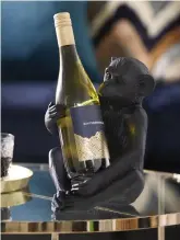  ??  ?? Monkey Bottle Holder, £ 20 ( other items from a selection), Dunelm
Your best bottle of Bordeaux or Chilean carmenere deserves to be seen, especially in the safe arms of this beautiful baby monkey.