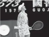  ?? CLIVE BRUNSKILL/GETTY ?? Ashleigh Barty celebrates match point in the singles final against Danielle Collins at the Australian Open on Saturday in Melbourne, Australia.