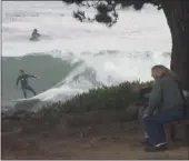  ?? ROSS ERIC GIBSON COLLECTION ?? West Cliff provides an intimate view of surfing, as here on Bliss Point west of Mitchell's Cove.