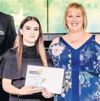  ??  ?? ●●Chloe winning the ‘Rising Star’ award at the GM Health and Care Awards 2019