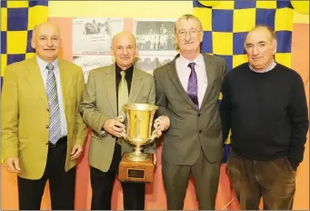  ??  ?? The Walsh triplets - Willie, Timmie and Jimmy and their brother Dan were members of the Ballydesmo­nd team who were four in a row Duhallow Champions.