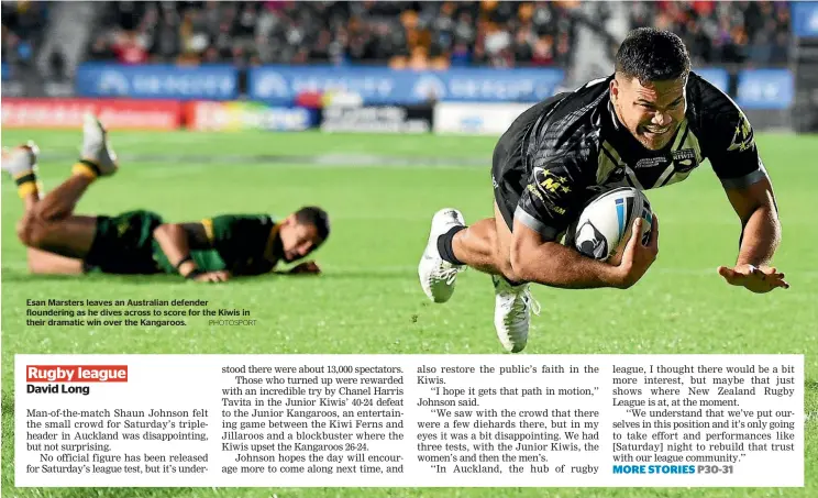  ?? PHOTOSPORT ?? Esan Marsters leaves an Australian defender flounderin­g as he dives across to score for the Kiwis in their dramatic win over the Kangaroos.