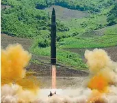  ??  ?? This photo distribute­d by the North Korean government shows what was said to be the launch of a Hwasong-14 interconti­nental ballistic missile. — AP