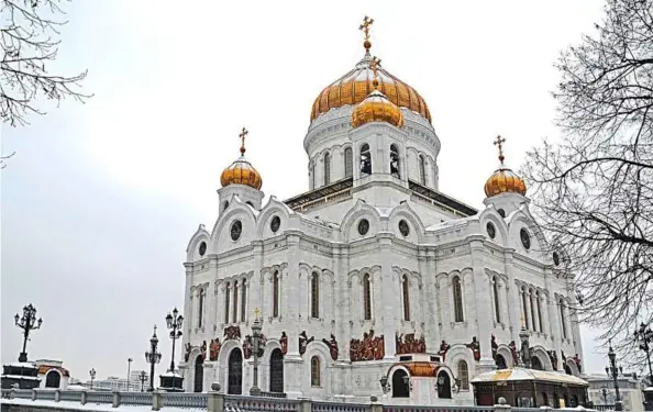  ??  ?? The Cathedral of Christ the Savior stands across the Mosvka River from the Kremlin in Moscow. - LAT/McClatchy-Tribune