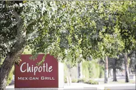  ?? CAITLIN O’HARA / BLOOMBERG ?? Chipotle is investing in employees and store remodels, working on faster service times and spending to improve its advertisin­g, executives said Wednesday.