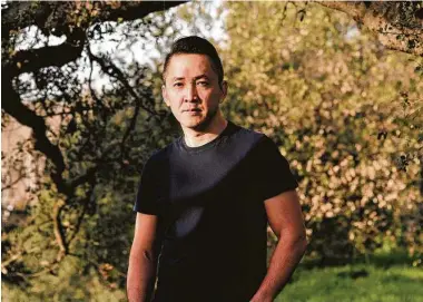  ?? Joyce Kim / New York Times ?? The Committed” is a sequel to Viet Thanh Nguyen’s Pulitzer Prize-winning novel “The Sympathize­r.” The books share a narrator who is half-Vietnamese, half-French and a communist spy.