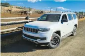  ?? HENRY PAYNE/THE DETROIT NEWS ?? The 2023 Jeep Wagoneer L carries six comfortabl­y for family road trips.