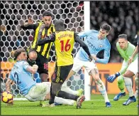  ??  ?? FRANTIC FINALE: Doucoure scores for Watford