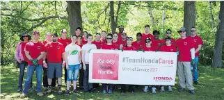  ??  ?? Honda Canada associates, including Dave Gardner, president and CEO, participat­e in a litter cleanup event along the shores of Lake Ontario, in conjunctio­n with the Honda Canada Foundation’s partnershi­p with A Greener Future.