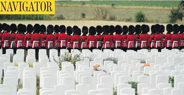  ?? JOHN THYS / AGENCE FRANCE-PRESSE / GETTY IMAGES ?? British Foot Guards participat­e in commemorat­ions for the 100th anniversar­y of the Battle of Passchenda­ele, which took place between July 31 and Nov. 6, 1917, in Belgium.