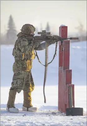  ?? PHOTO BY SEBASTIAN SAARLOOS ?? U.S. ARMY COLD REGIONS TEST CENTER, part of Yuma Proving Ground, staged a multiweek test of the Army’s Next Generation Squad Weapon (NGSW) earlier this year. The XM7 and XM250 are successors to the M4 rifle and M249 light machine gun that American forces have used for decades.