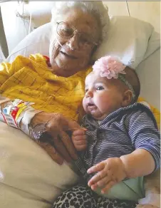  ??  ?? Tracee M. Herbaugh was raised by her grandmothe­r, seen with Herbaugh’s baby daughter. It wasn’t until she died that Herbaugh fully understood the immense sacrifice Grandma had made.
TRACEE M. HERBAUGH