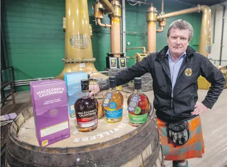  ?? DARREN STONE, TIMES COLONIST ?? Graeme Macaloney, the founder of Macaloney’s Caledonian Distillery, is locked in a battle with the Scotch Whisky Associatio­n over use of his name and other images on his whisky.