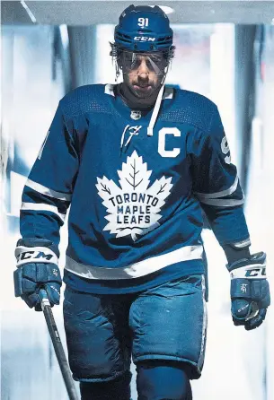  ?? MARK BLINCH GETTY IMAGES ?? No one would dispute that John Tavares is the heart and soul of the hockey club, Damien Cox writes, but is his quiet consistenc­y what the Leafs need from their captain?