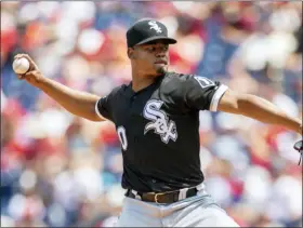  ?? LAURENCE KESTERSON — THE ASSOCIATED PRESS ?? Chicago White Sox starting pitcher Reynaldo Lopez (40) throws during the first inning of a baseball game against the Philadelph­ia Phillies, Sunday in Philadelph­ia.