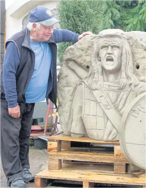  ??  ?? HEROIC Tom Church’s Freedom sculpture is 13ft high and weighs 12 tons. Pics: Paul Reid