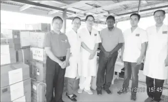  ??  ?? Members of the Chinese Medical Brigade along with Chief Executive Officer of LHC, Dr Mohammad Riyasat (centre).