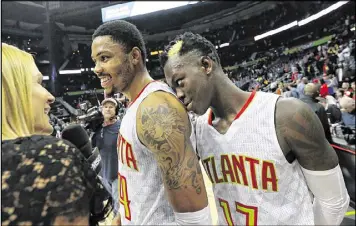  ?? CURTIS COMPTON / CCOMPTON@AJC.COM ?? Kent Bazemore (left) and Dennis Schroder are among six Hawks under contract for 2017-18. Schroder might be their only building block.